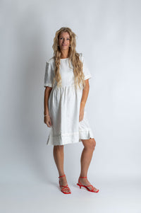 Tidal whirl flare ruffle dress in White - Attires