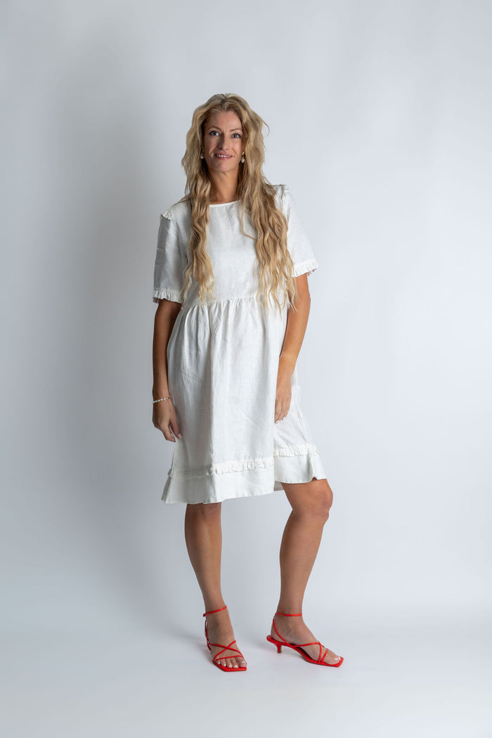 Tidal whirl flare ruffle dress in White - Attires