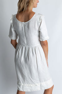 Tidal whirl flare ruffle dress in White - Attires