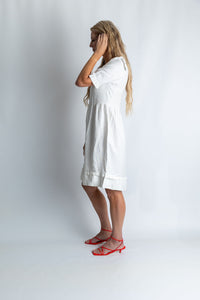 Tidal whirl flare ruffle dress in White - Attires